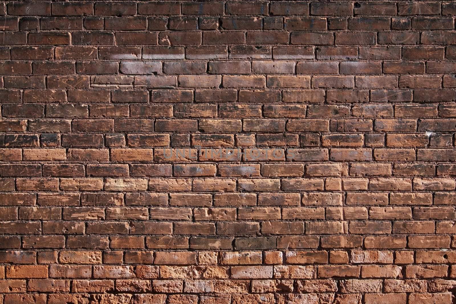 Rough and weathered brick wall - grunge background