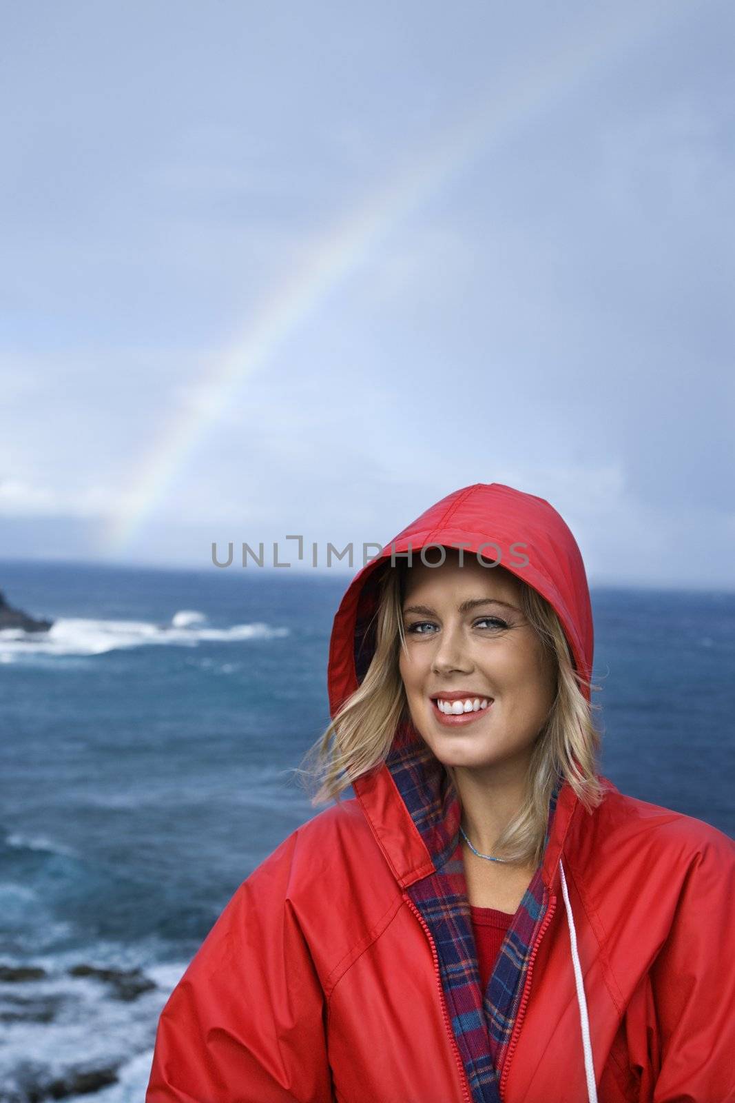Woman with rainbow. by iofoto