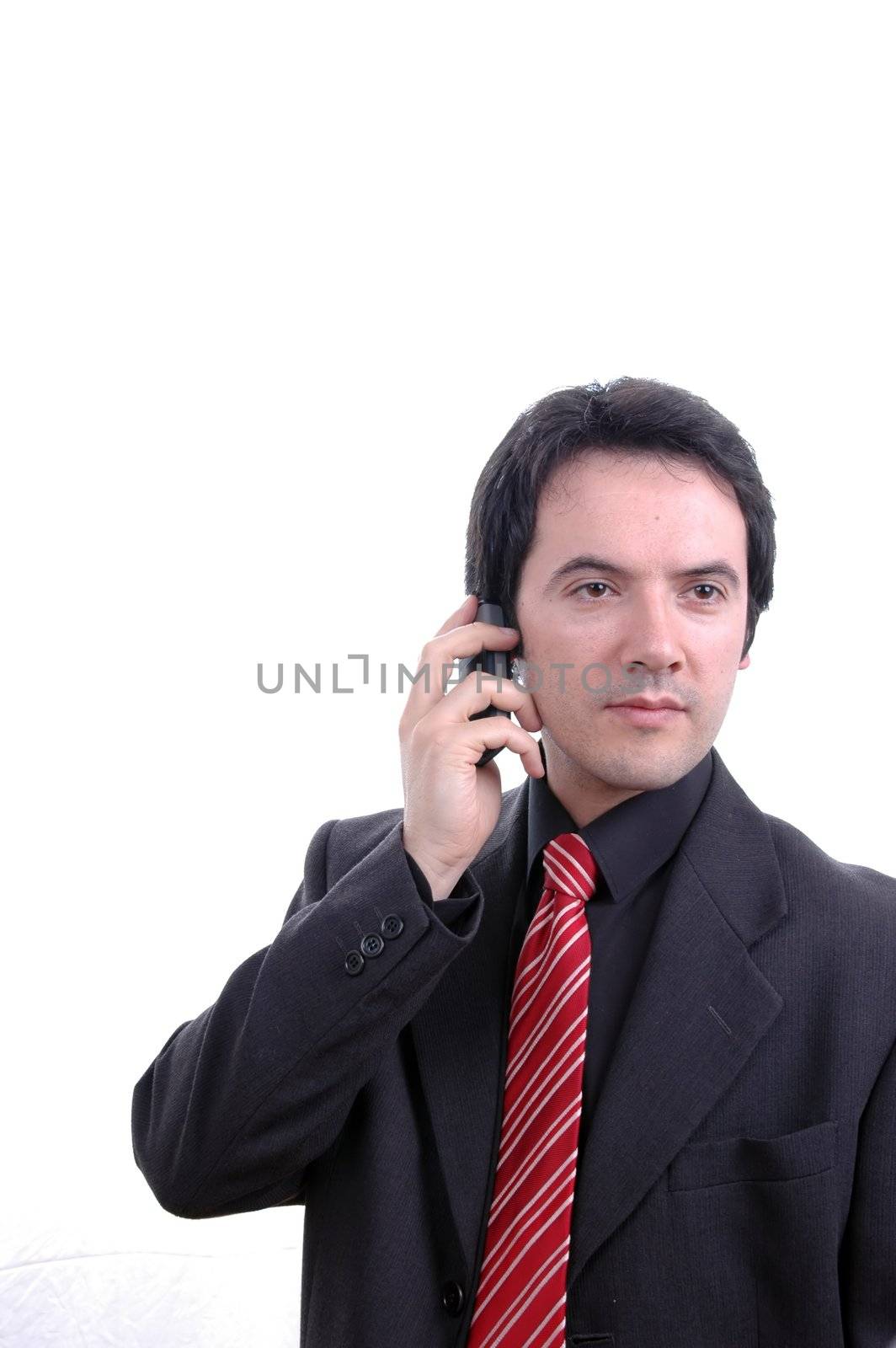 businessman talking with cell phone by raalves