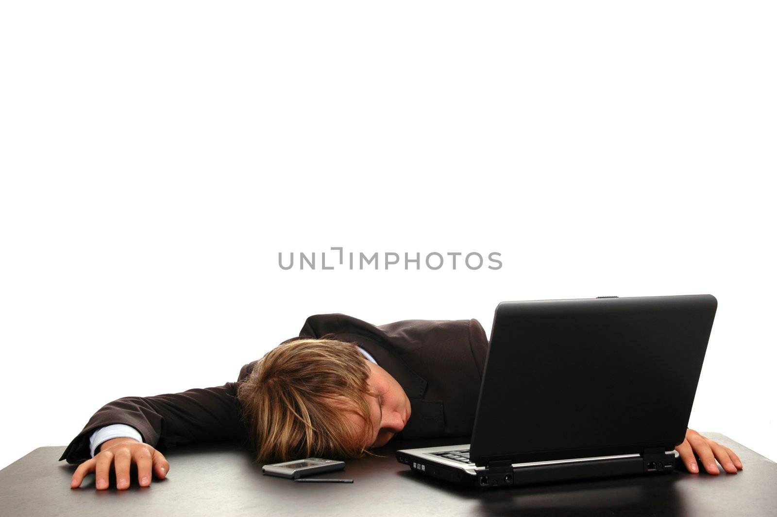 businessman sleeping on computer after hard work day
