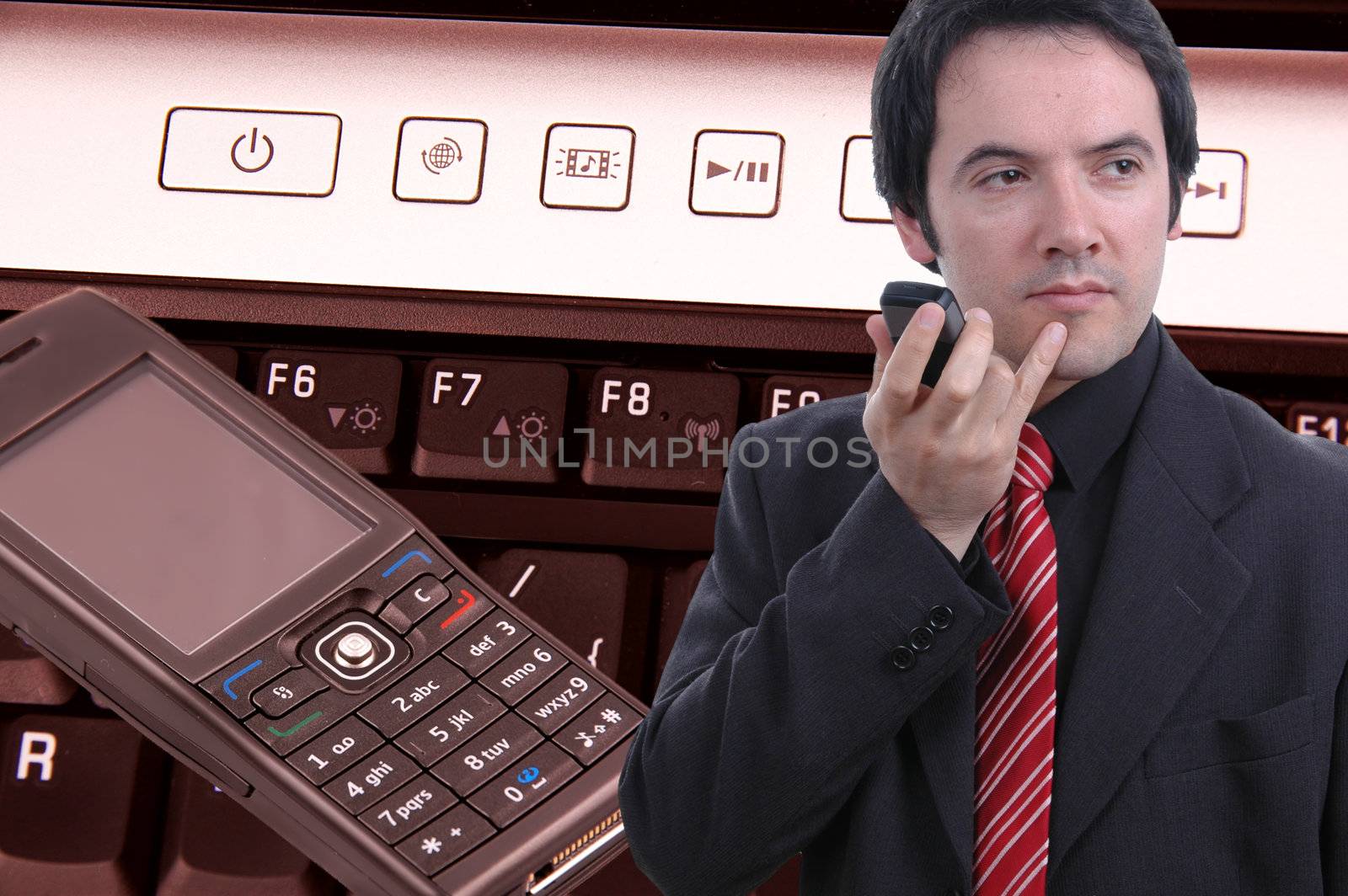 businessman, keyboard and cell phone by raalves