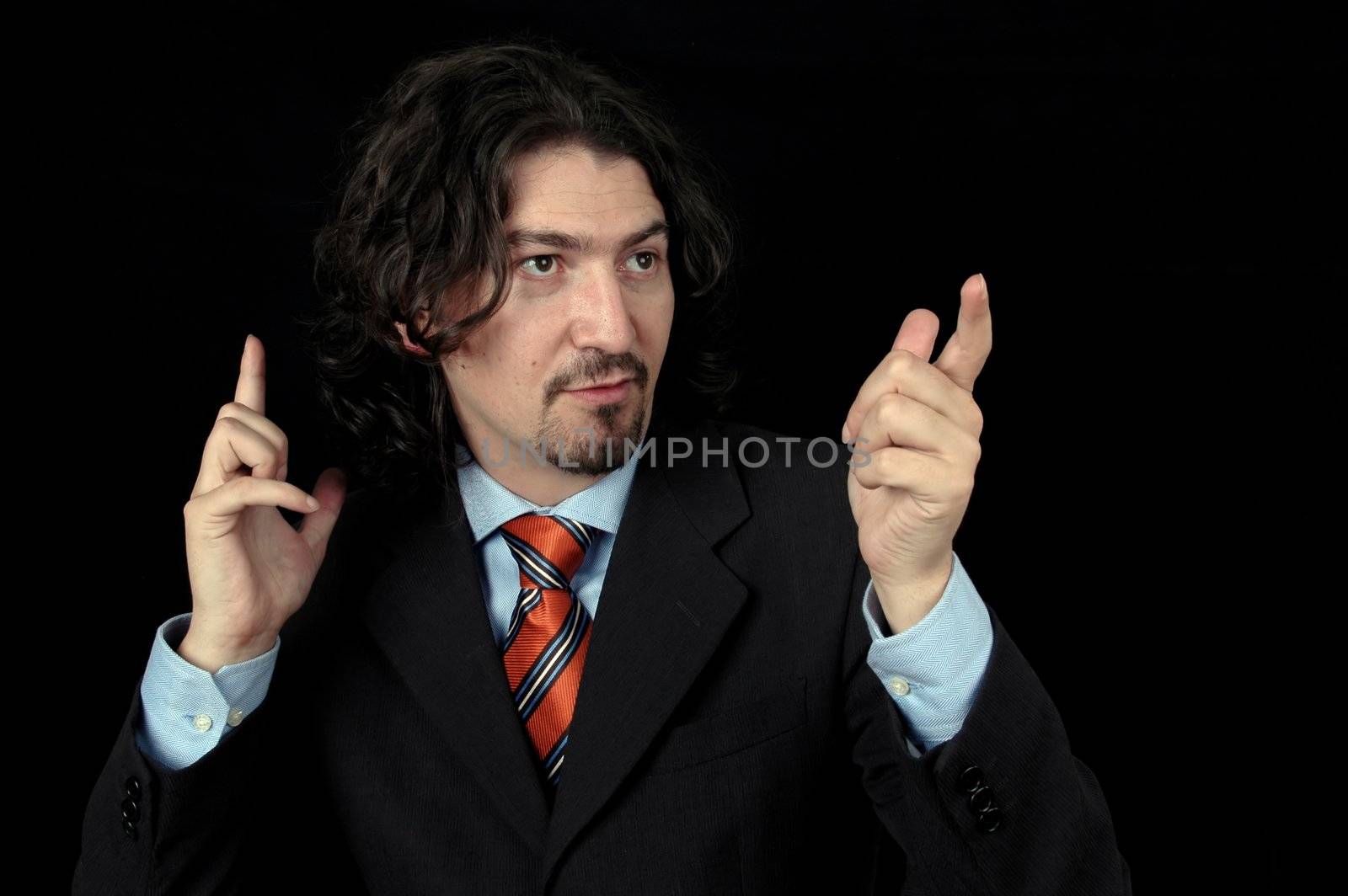 young businessman ointing fingers to air