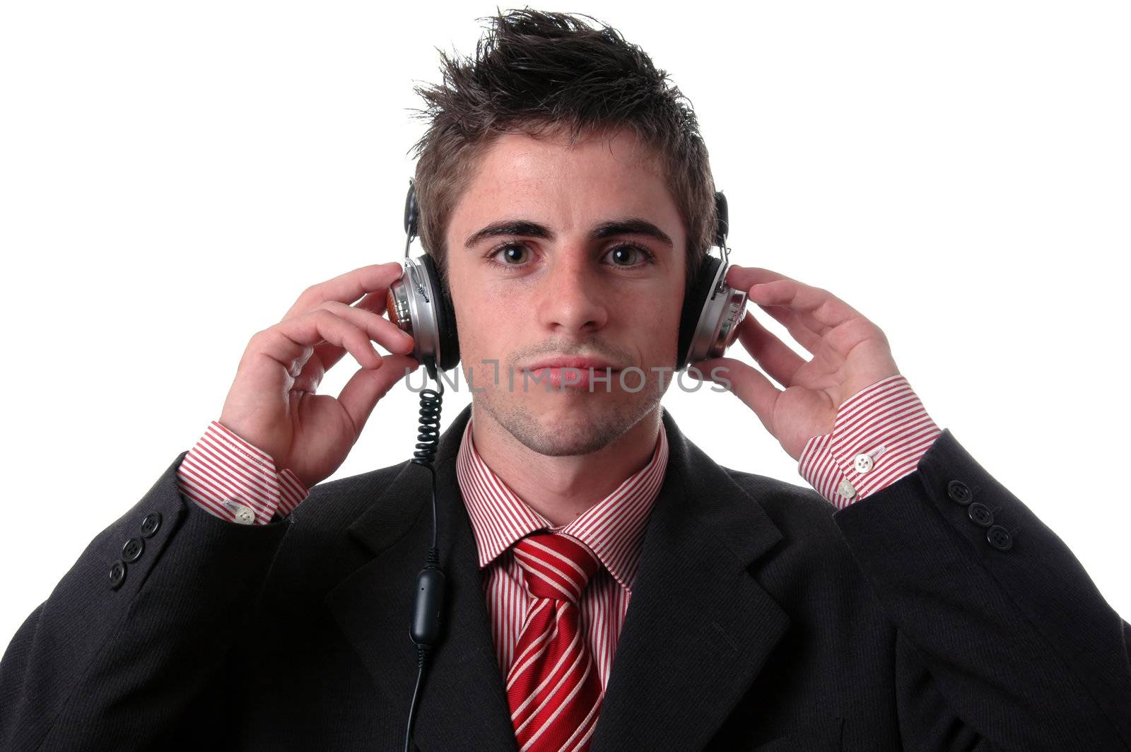 young businessman listen music on white