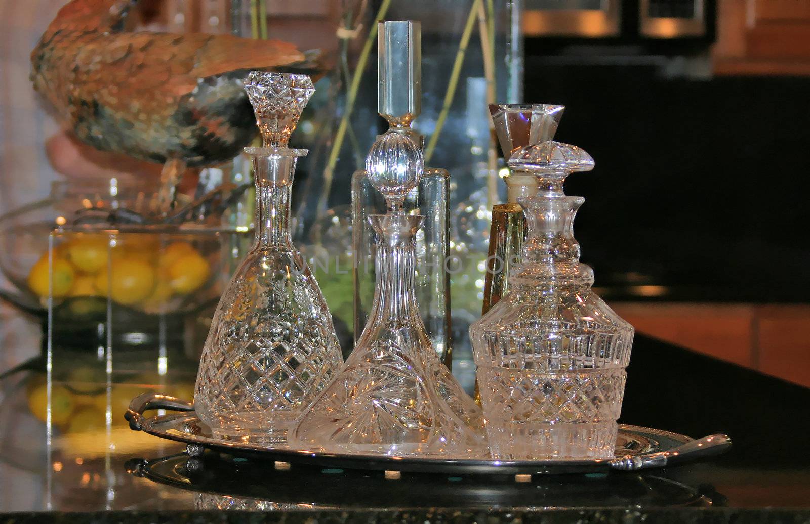 Crystal Decanters on a Kitchen Counter by KevinPanizza