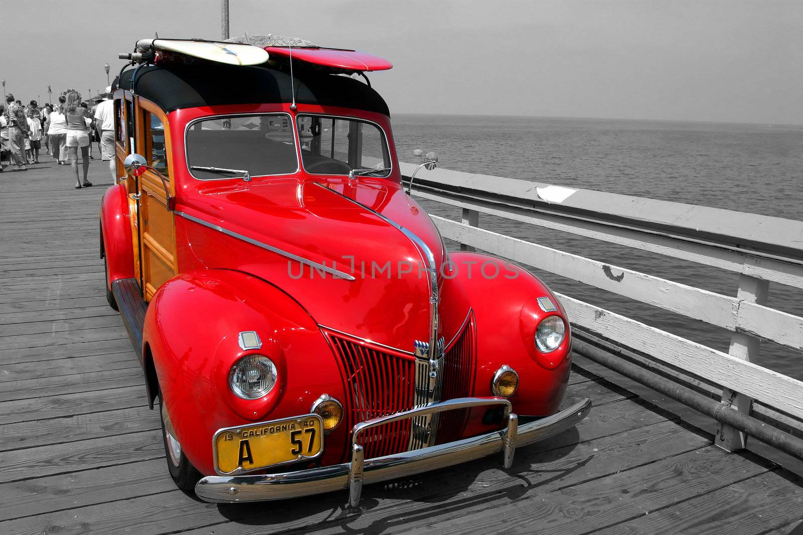 Red Woodie on a Pier with black and white background