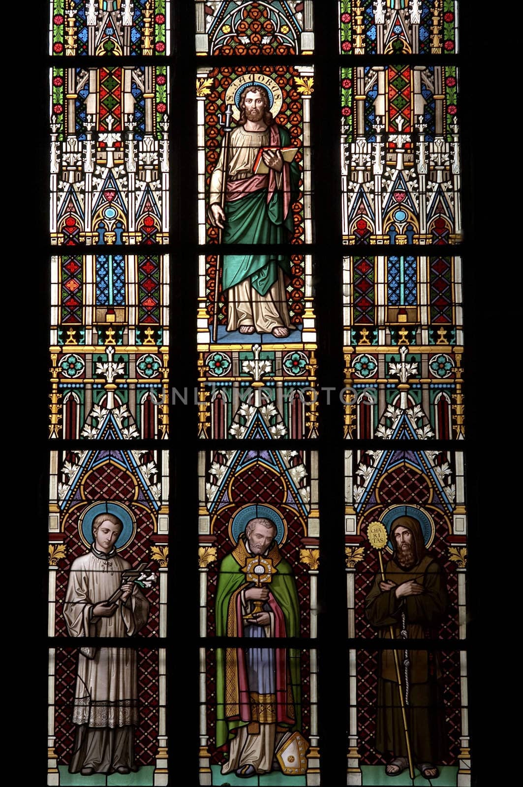 Detail of the color window - bullseye pane - lattice window. Public national monument - cathedral of St Vitus, Prague, Czech republic, Europe.