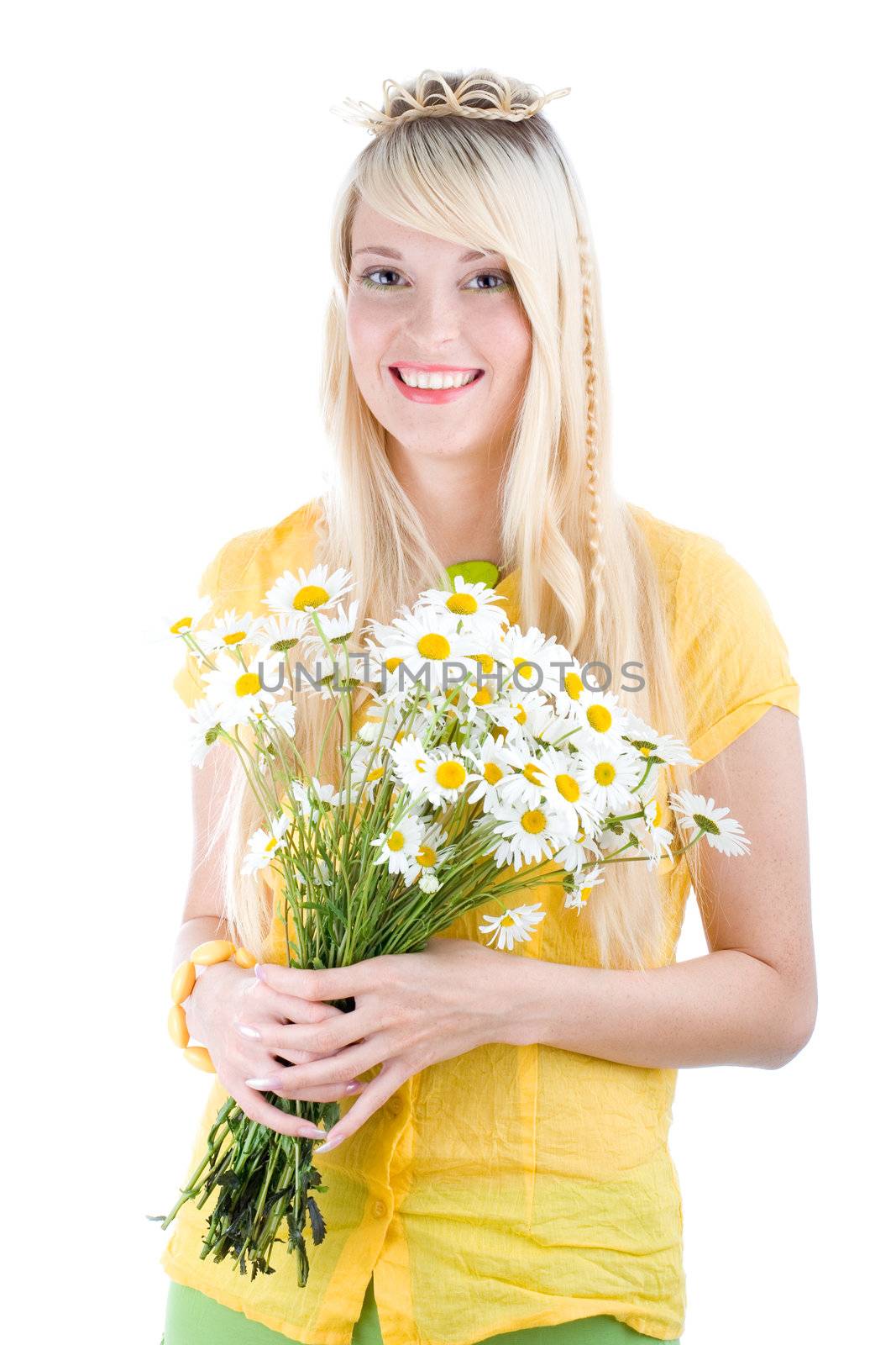 Smiling young blond girl with bunch of flowers