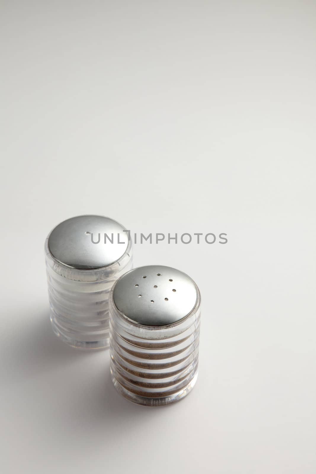 Salt and Pepper Shakers on the white background