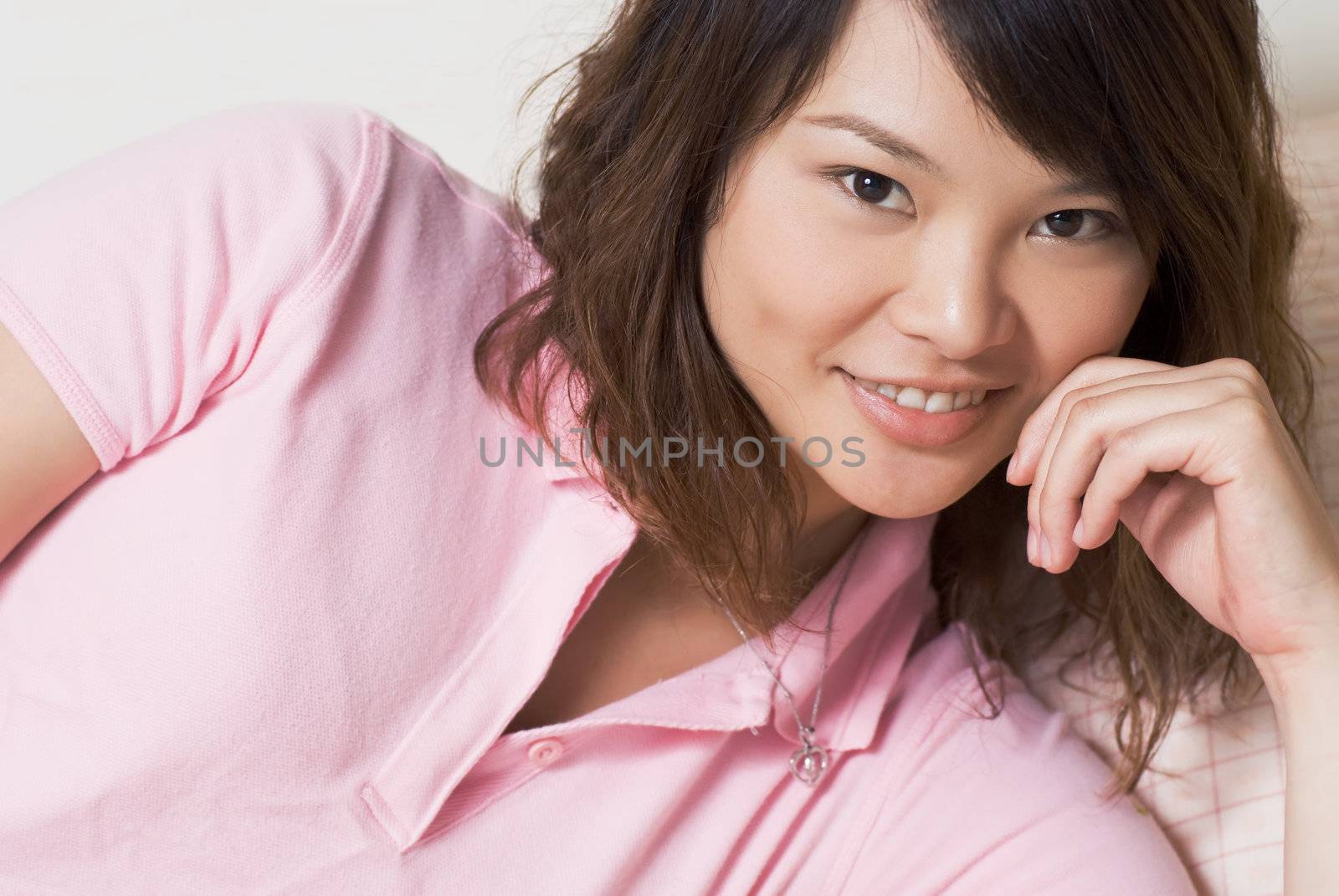 Asian woman with beautiful face in home.