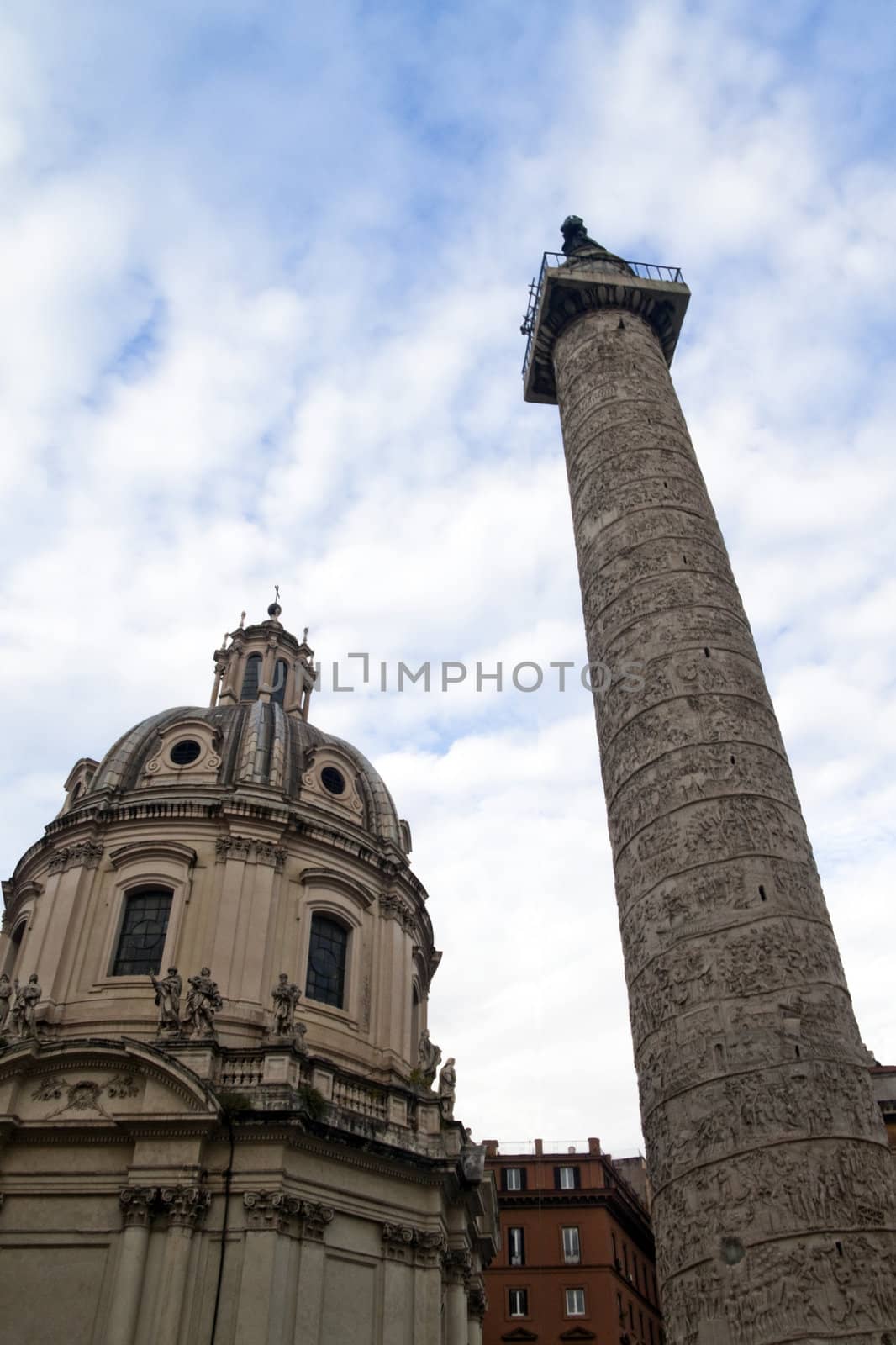 Trajan's column reaching into the blue sky, Rome, Italy