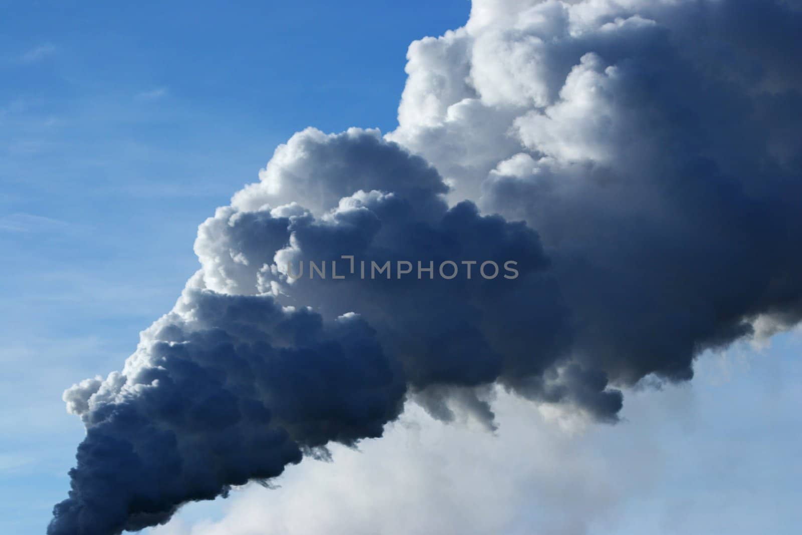 Smoke pillar rising up into the sky