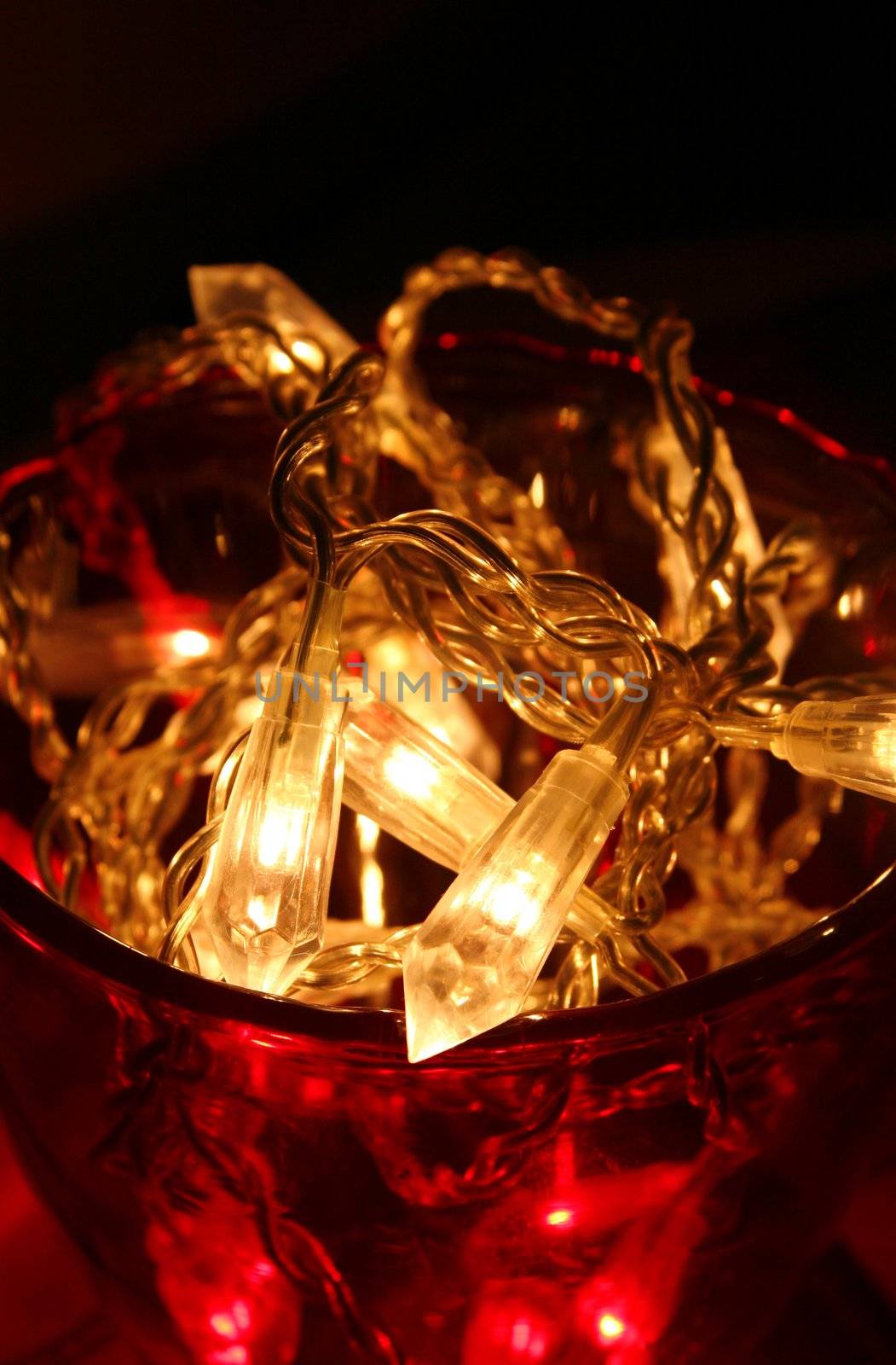 Macro of decorative lights in beautiful red bowl