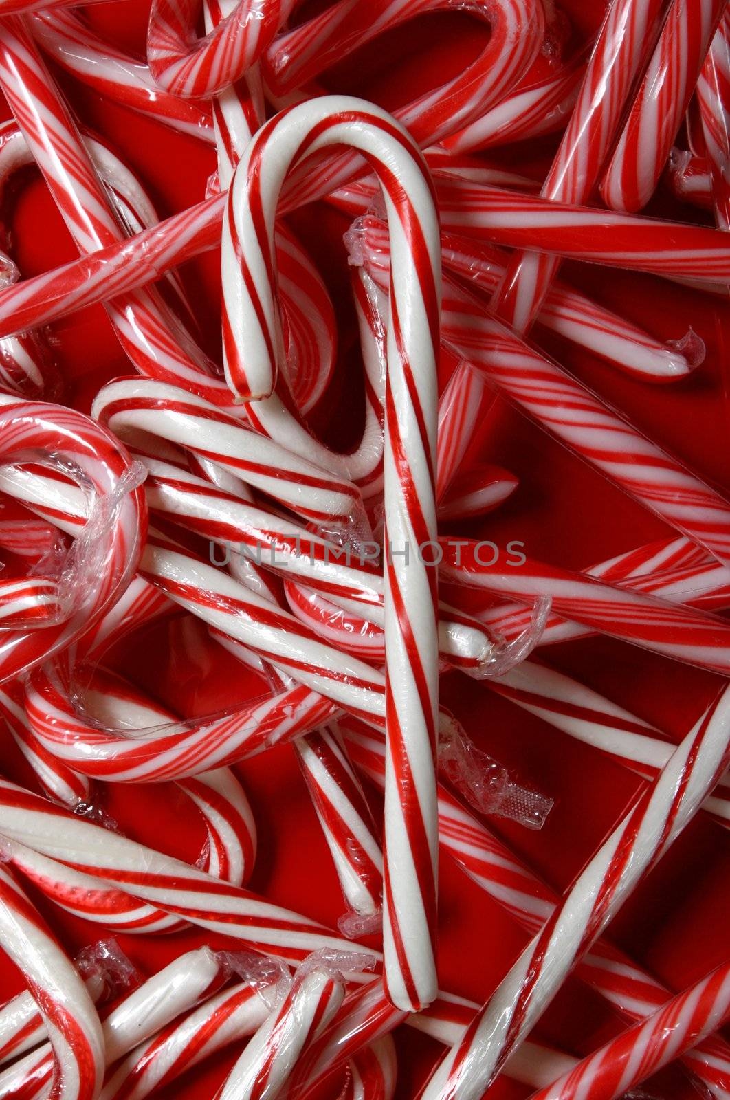 Red christmas background with traditional candy canes