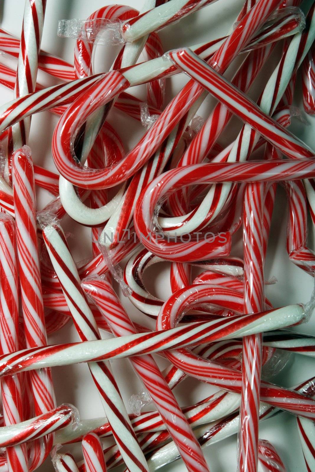 Sweet christmas background with all kinds of candy canes