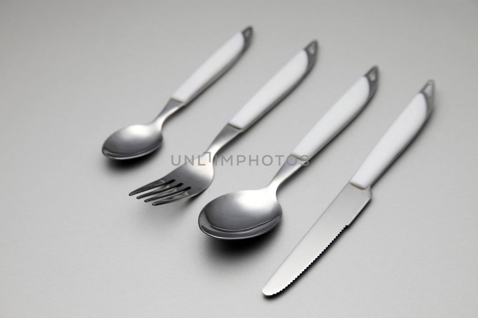 cutlery set on the plain color background