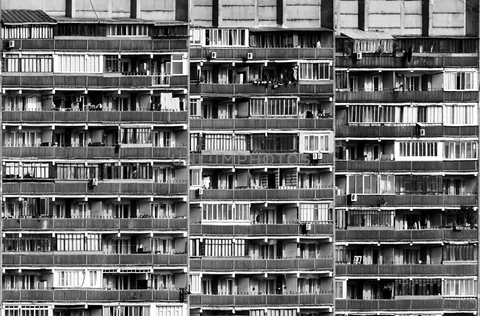 an amazing divercity of windows and balconies on a residential building