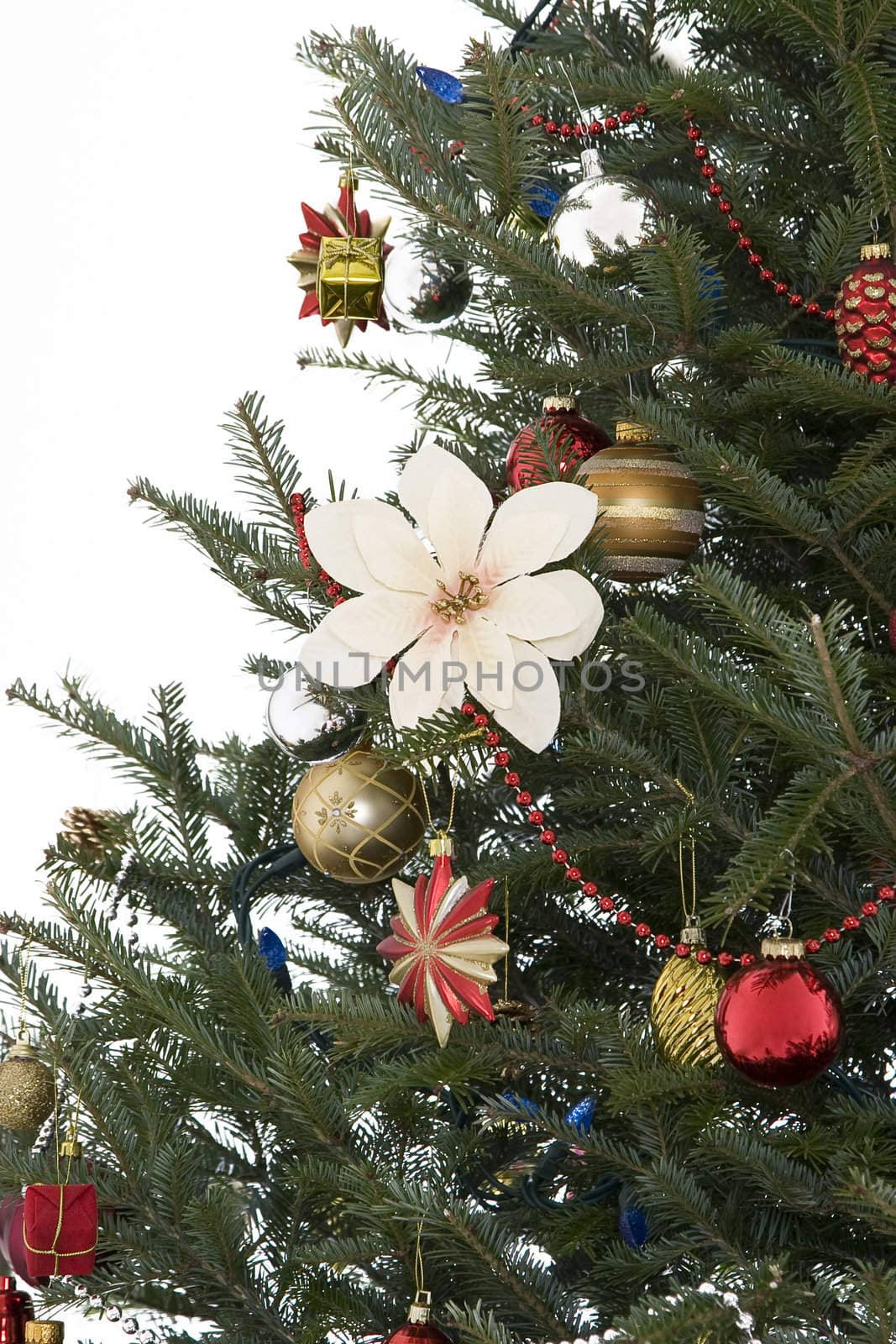 decorated christmas tree in a red, gold and silver palette
