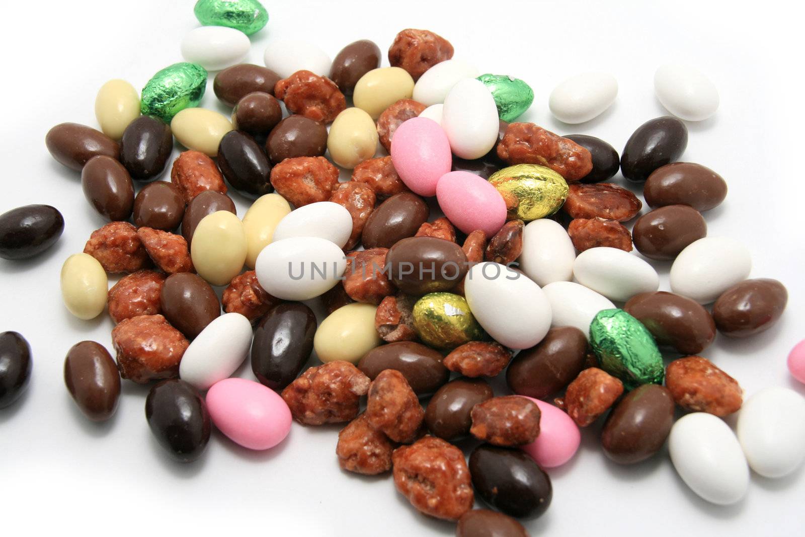 beautiful sweet easter almonds over white background