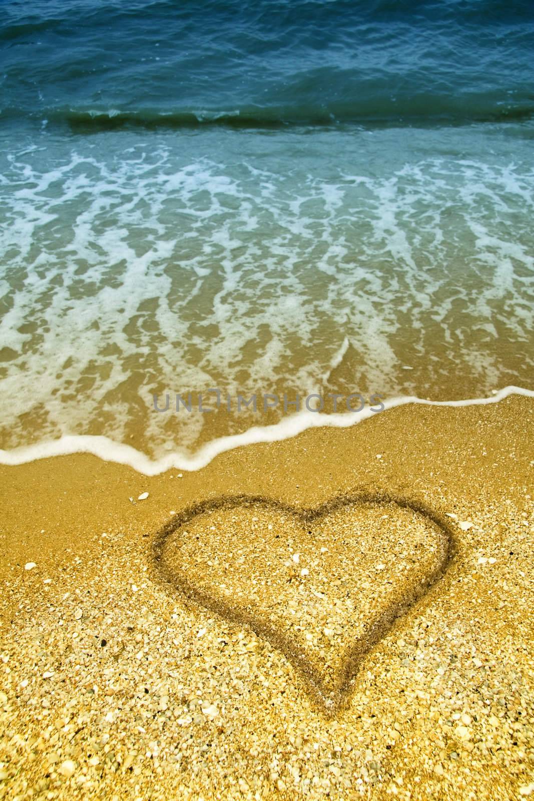 heart in the sand on beach