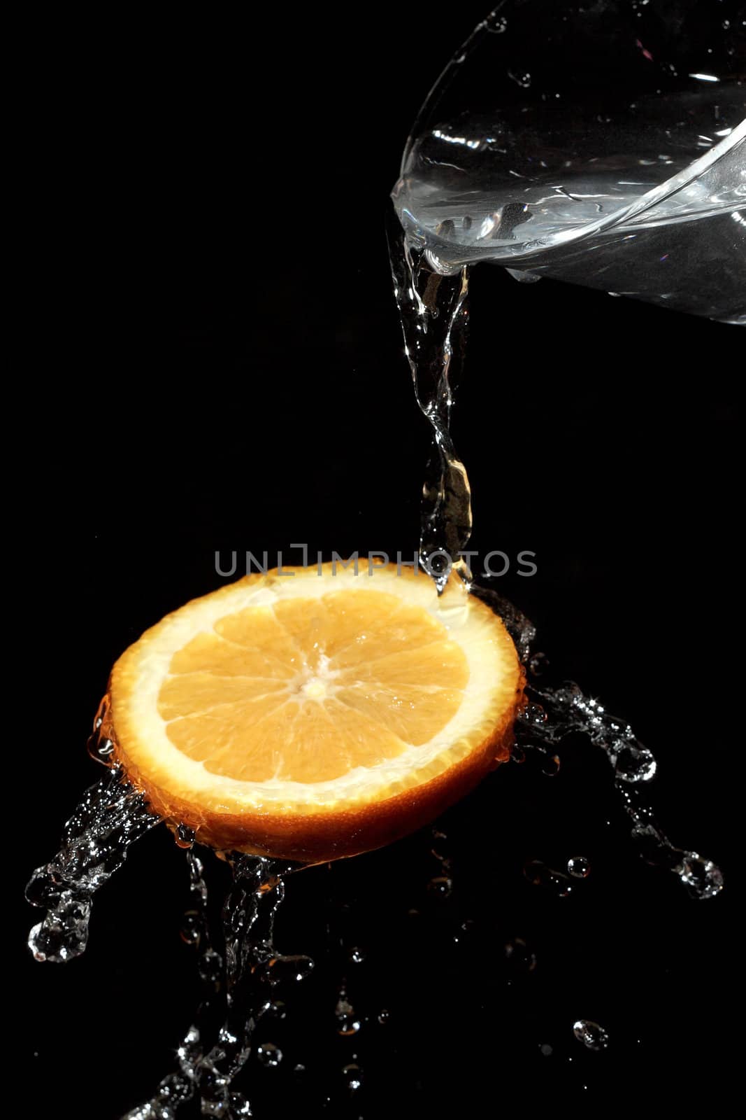 The water which is flowing down from segments of fruit
