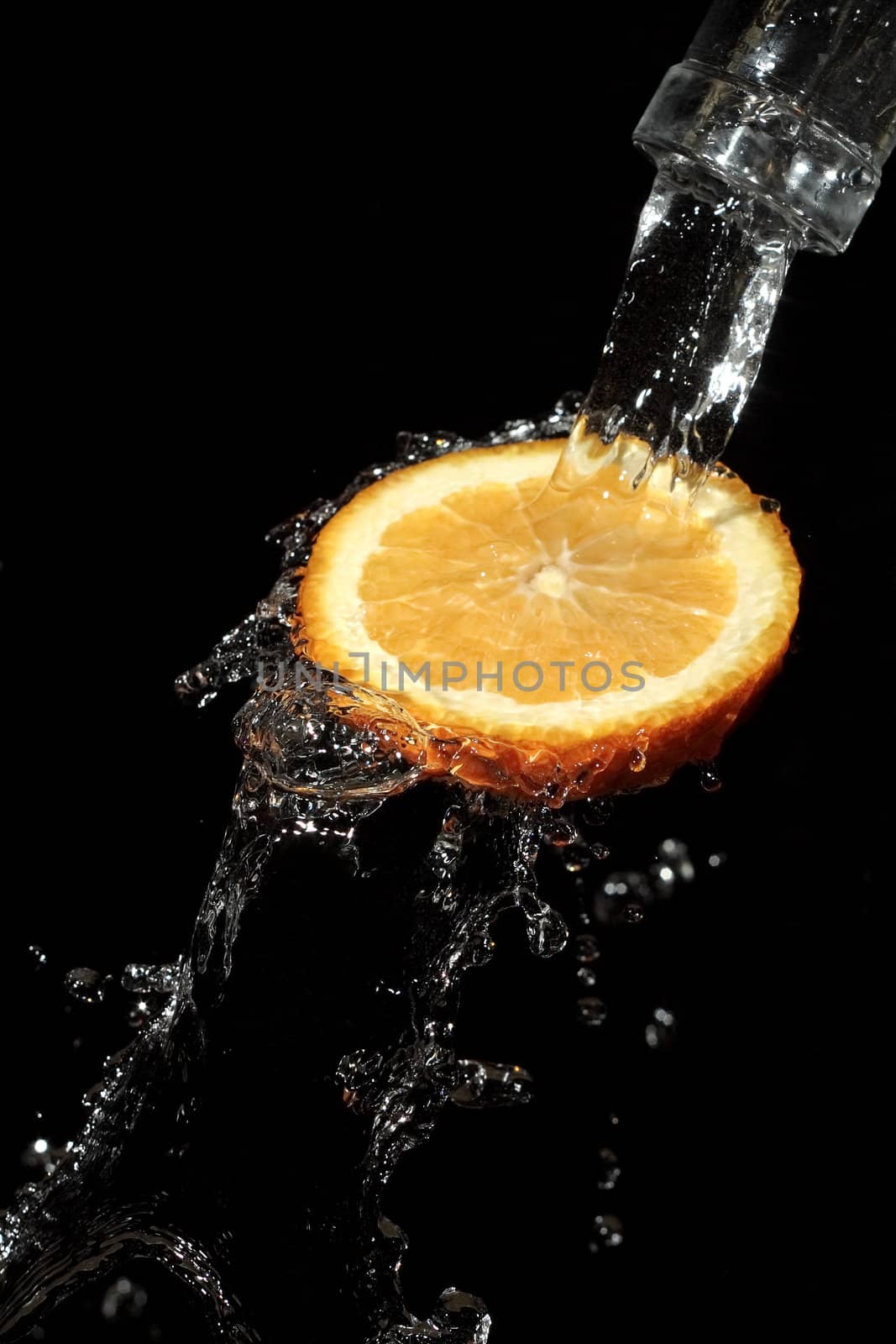 The water which is flowing down from segments of fruit
