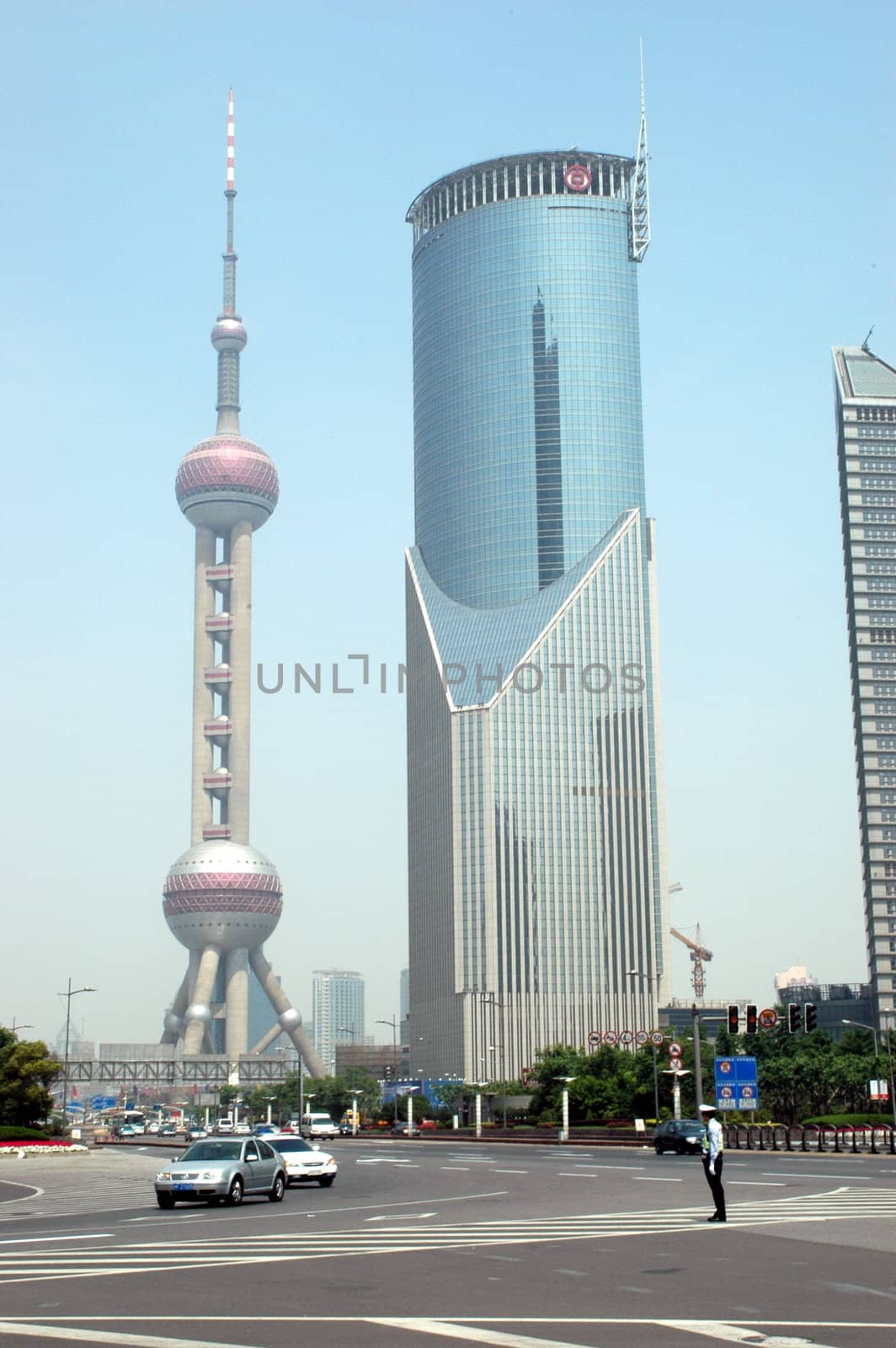 Pudong area in Shanghai with modern skyscrapers and famous Orient Pearl TV tower.