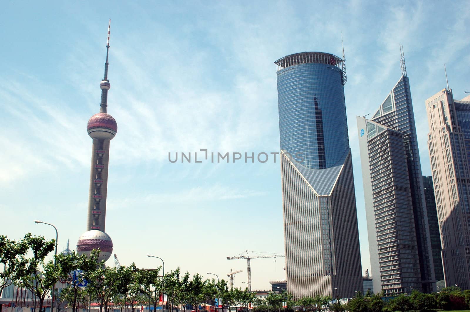 Shanghai - city center with moderns office buildings and Orient Pearl tower.