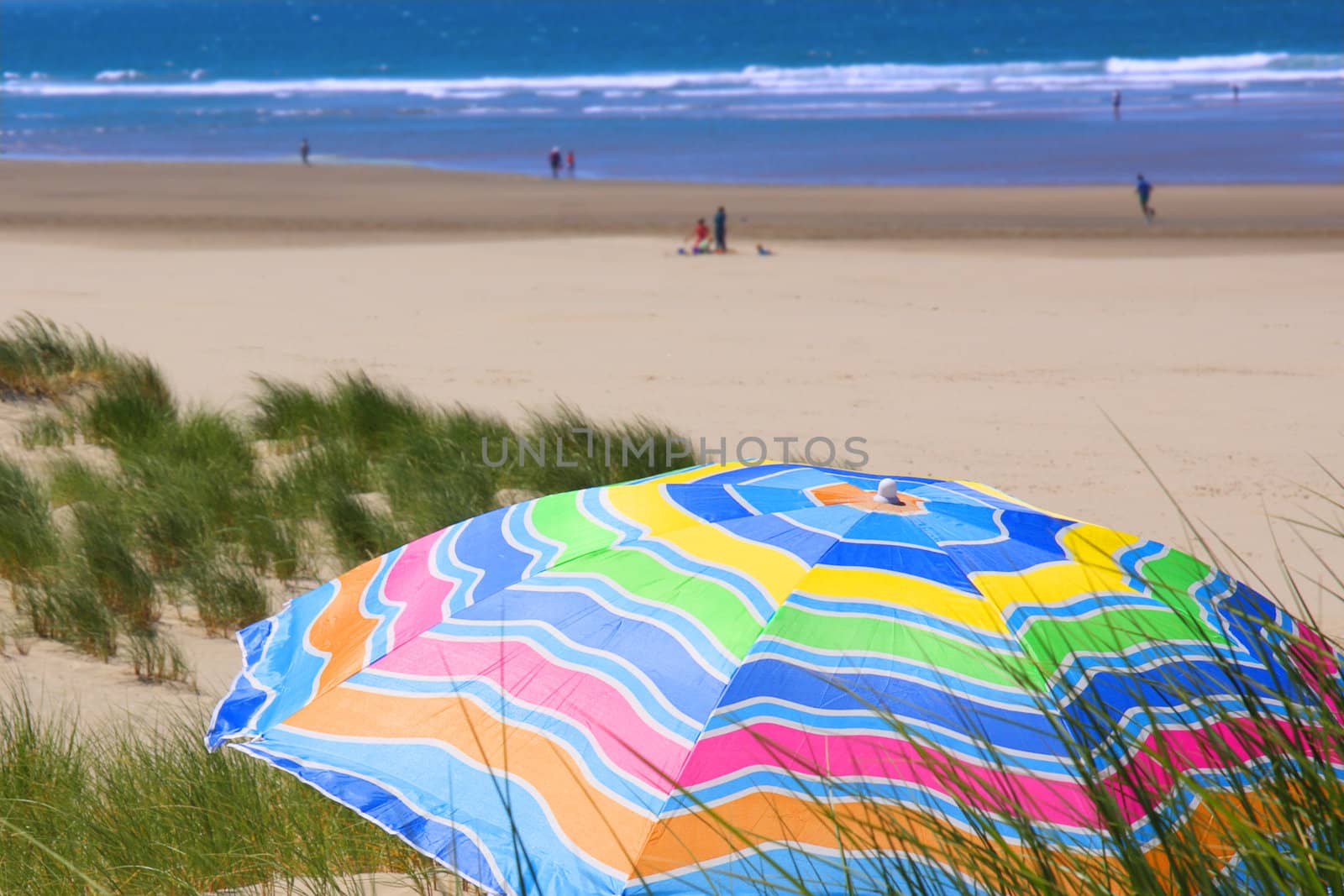 Bright, colorful umbrella on the beach