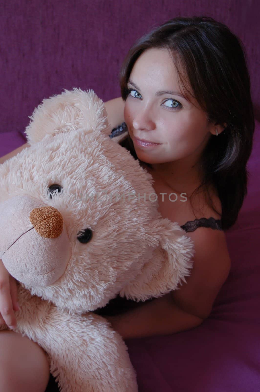 Beautiful girl with teddy bear