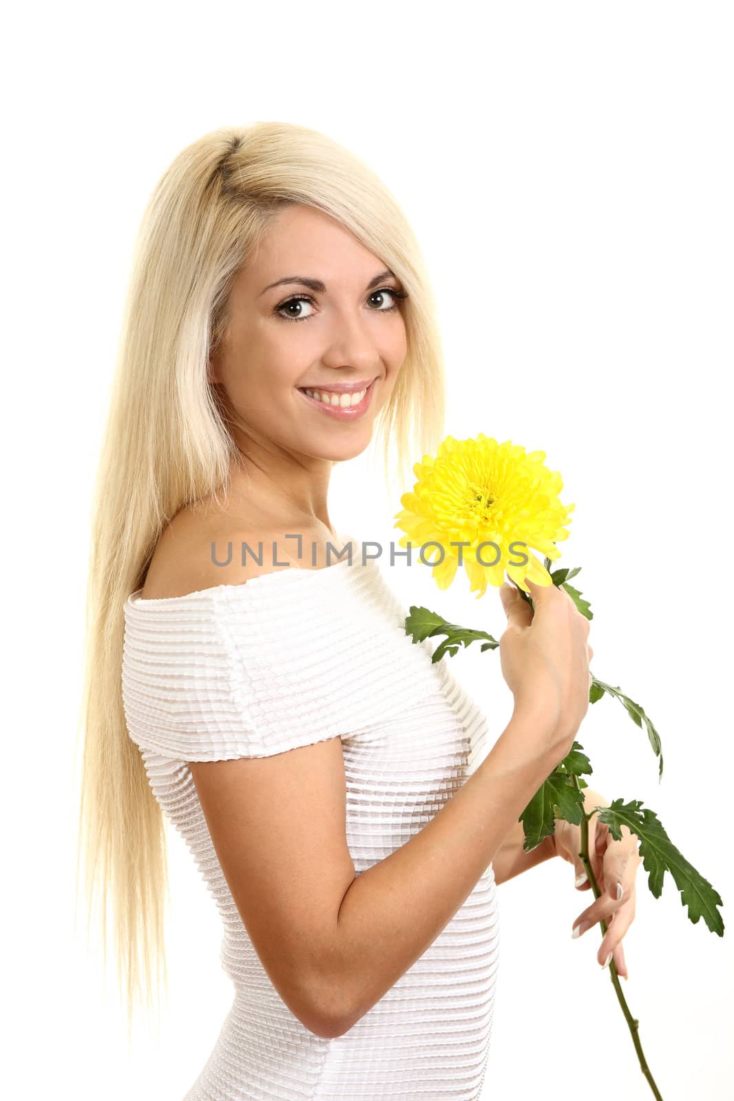 Portrait of the beautiful girl with a flower
