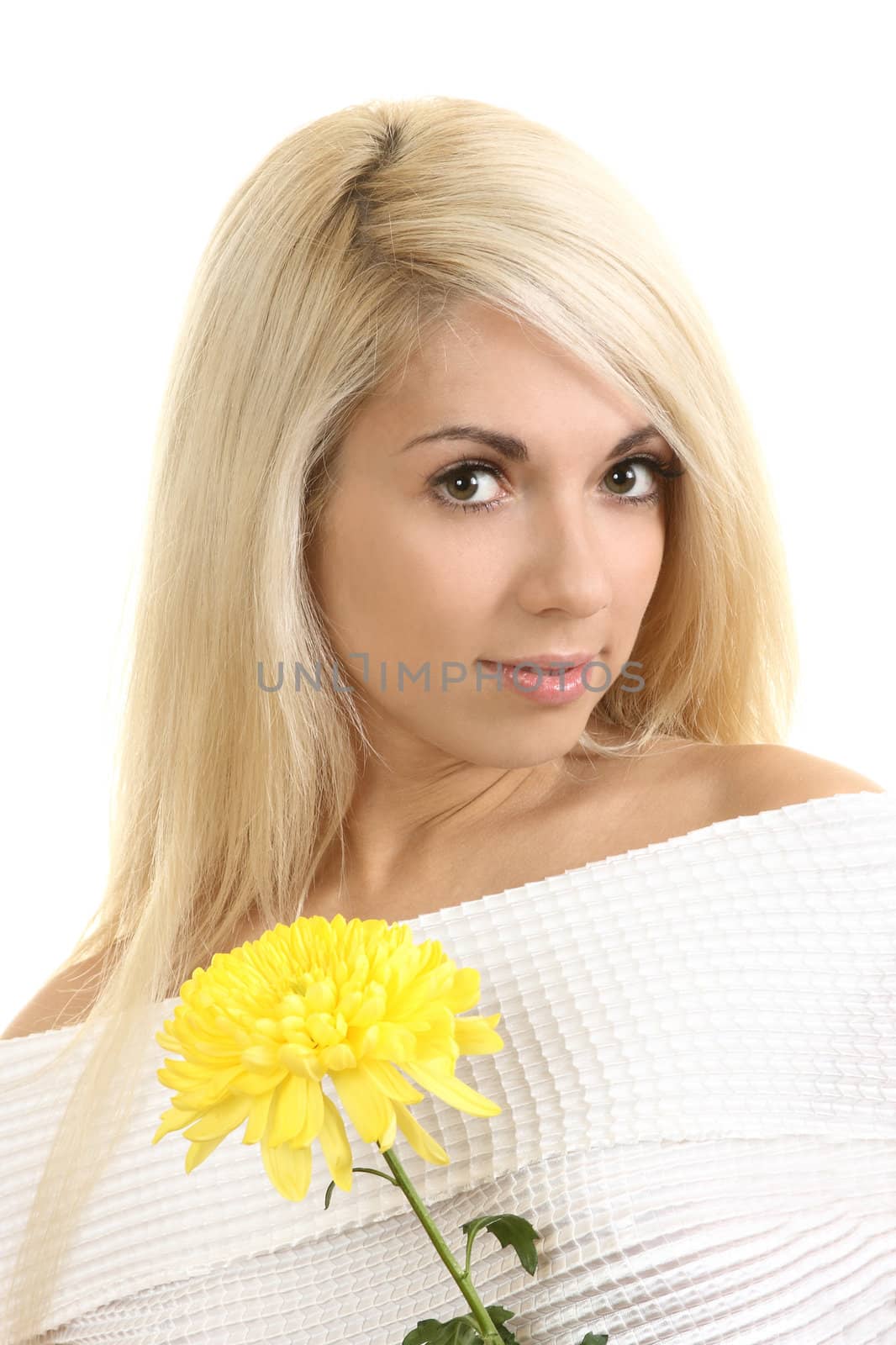 Portrait of the beautiful girl with a flower
