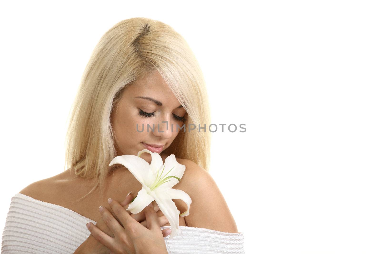 Portrait of the beautiful girl with a flower
