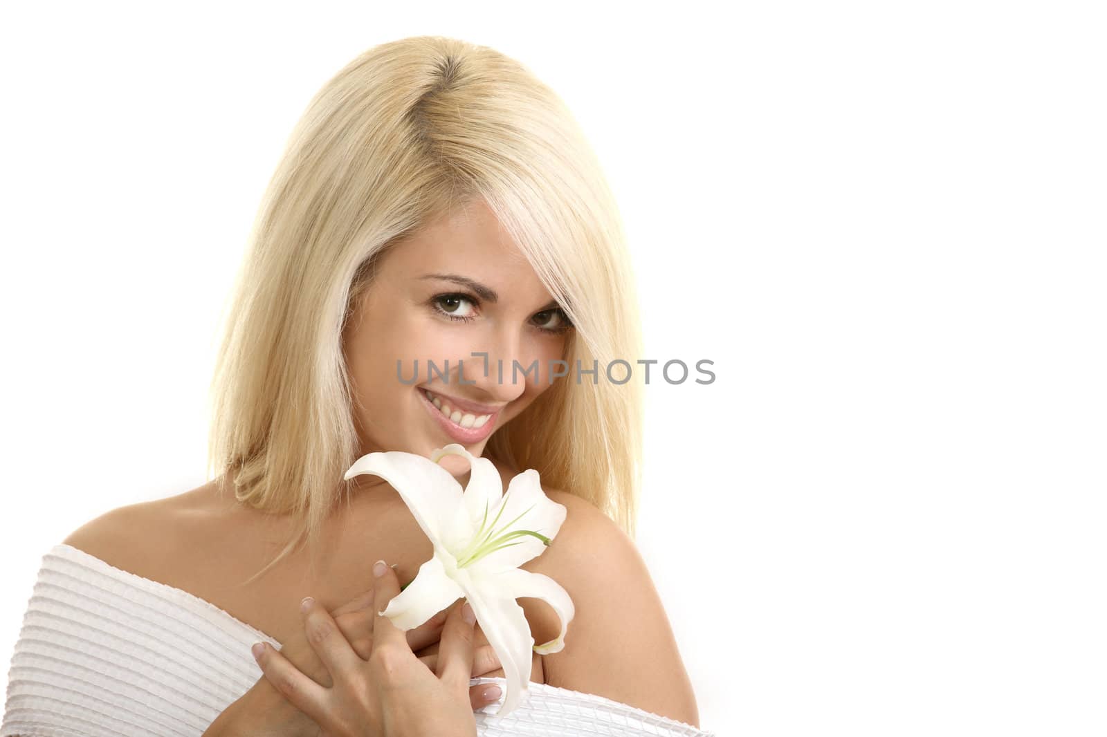 Portrait of the beautiful girl with a flower