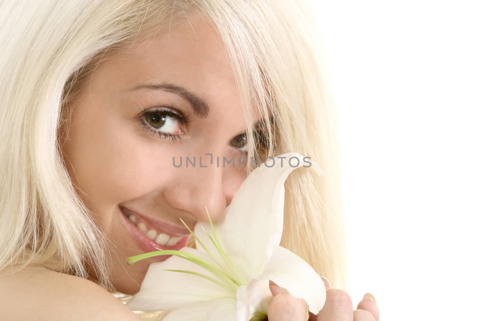 Portrait of the beautiful girl with a flower