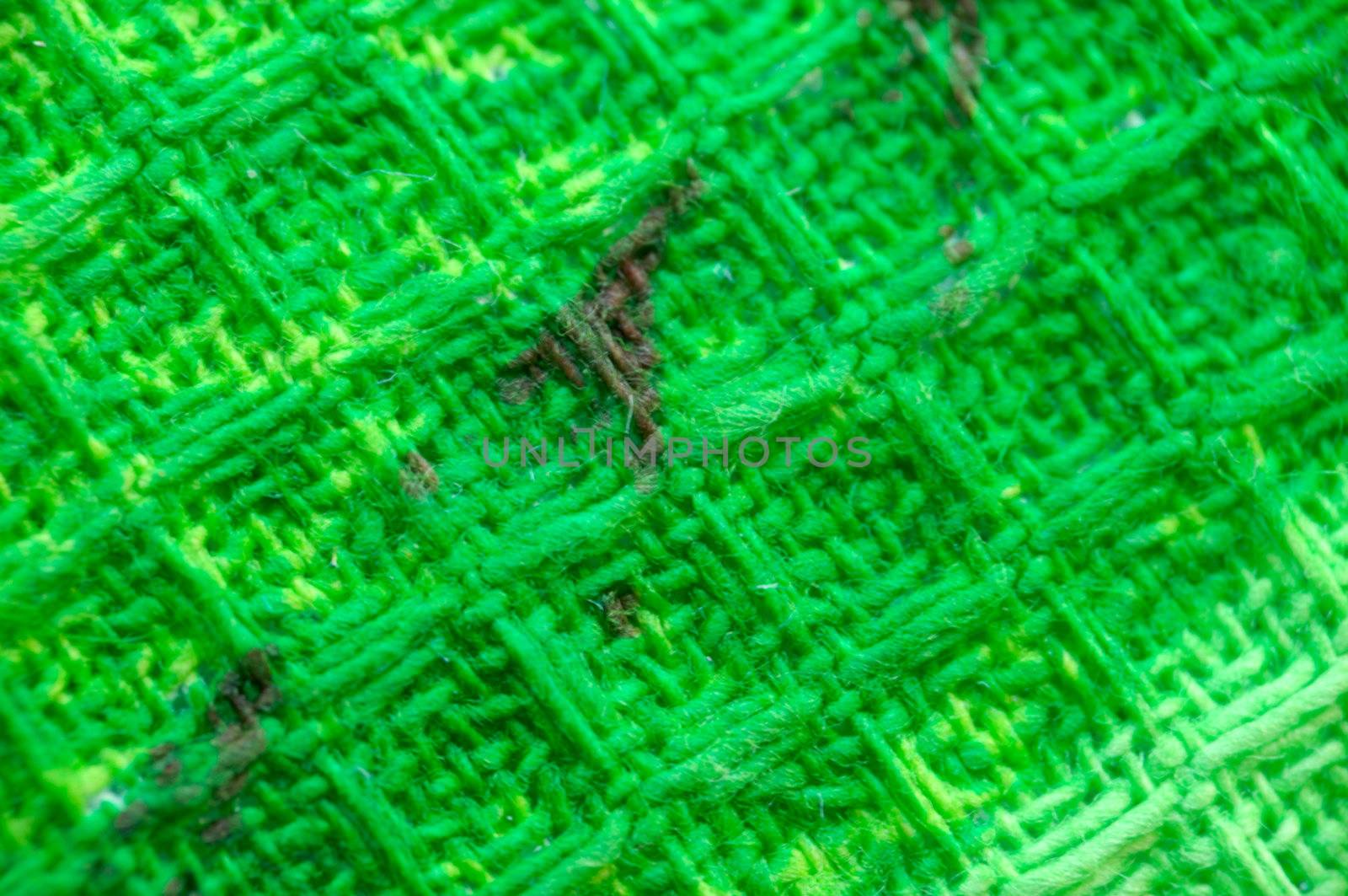 macro pattern of green textile fabric