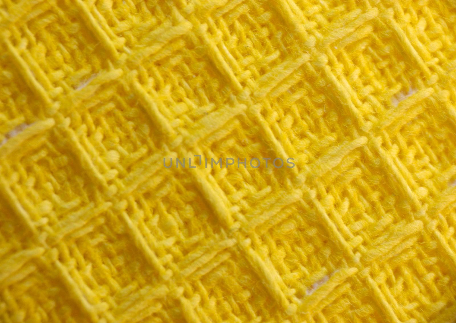 macro pattern of yellow textile fabric