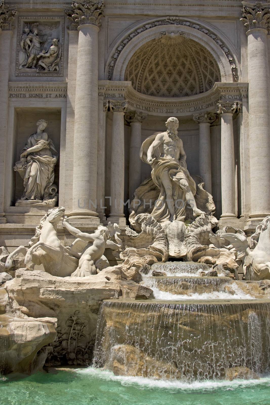 Colorful antique fountain de Trevi at sunny day in Rome