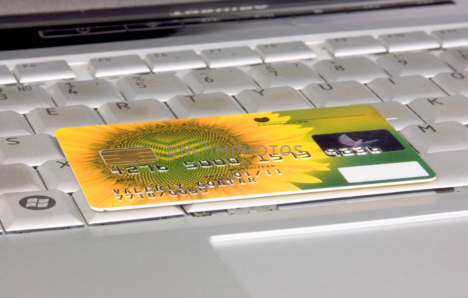 credit card on computer in office