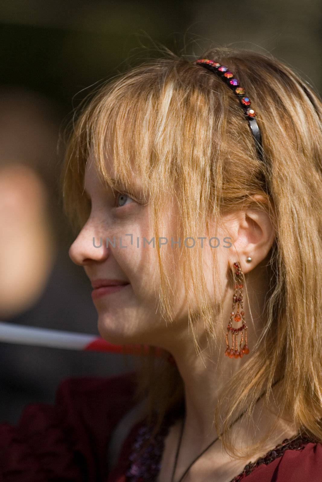 smiling girl with red hair
