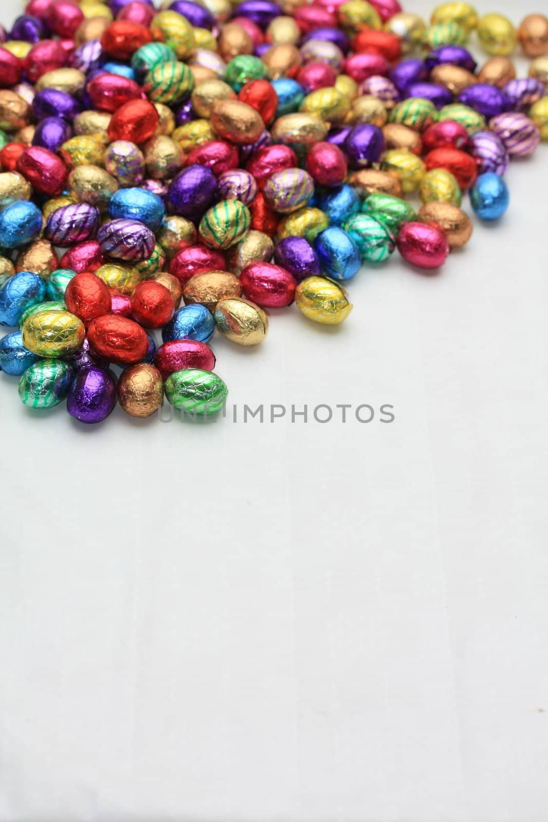 Pile of easter eggs with copy space by studioportosabbia