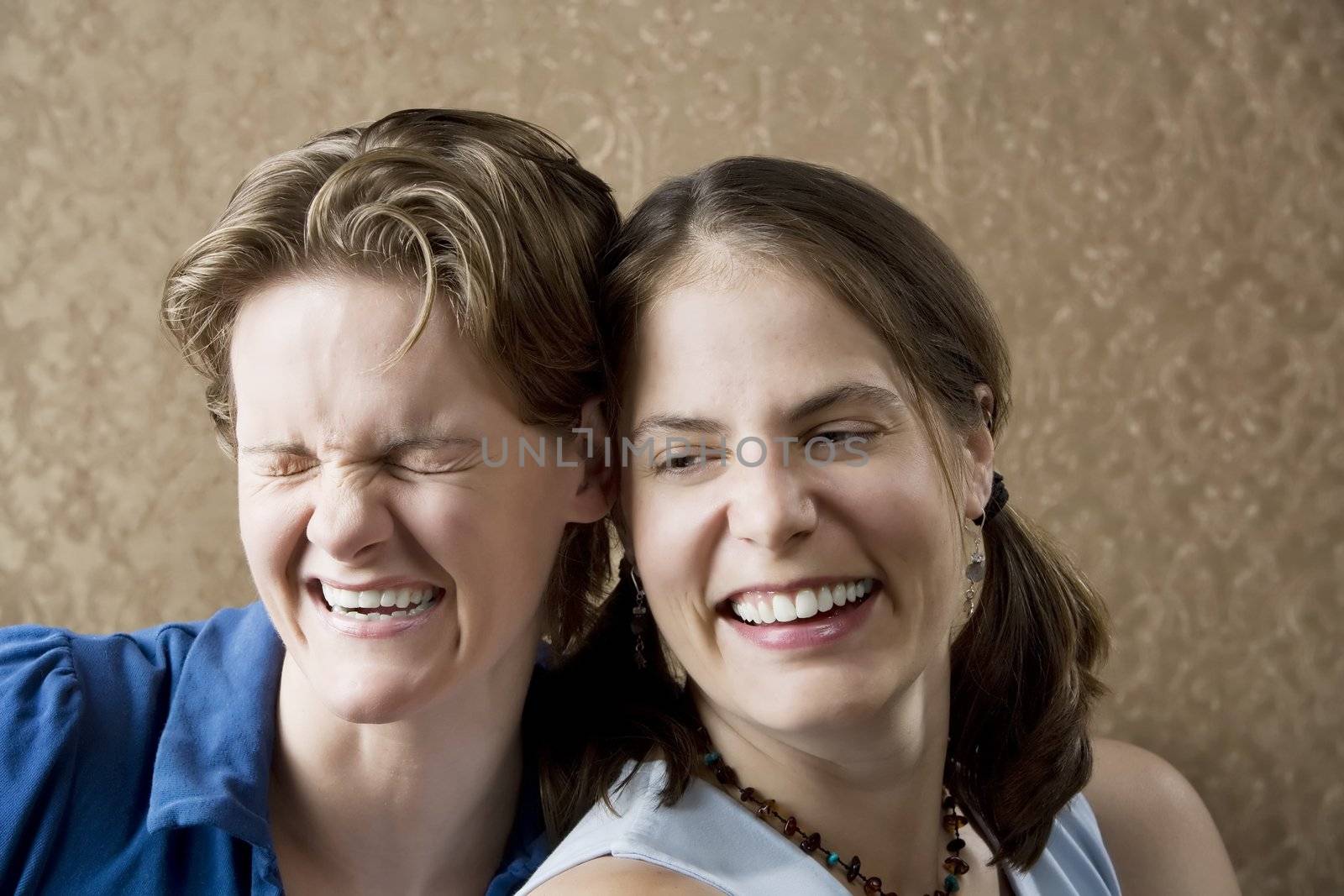 Portrait of Two Young Women Friends Laughing