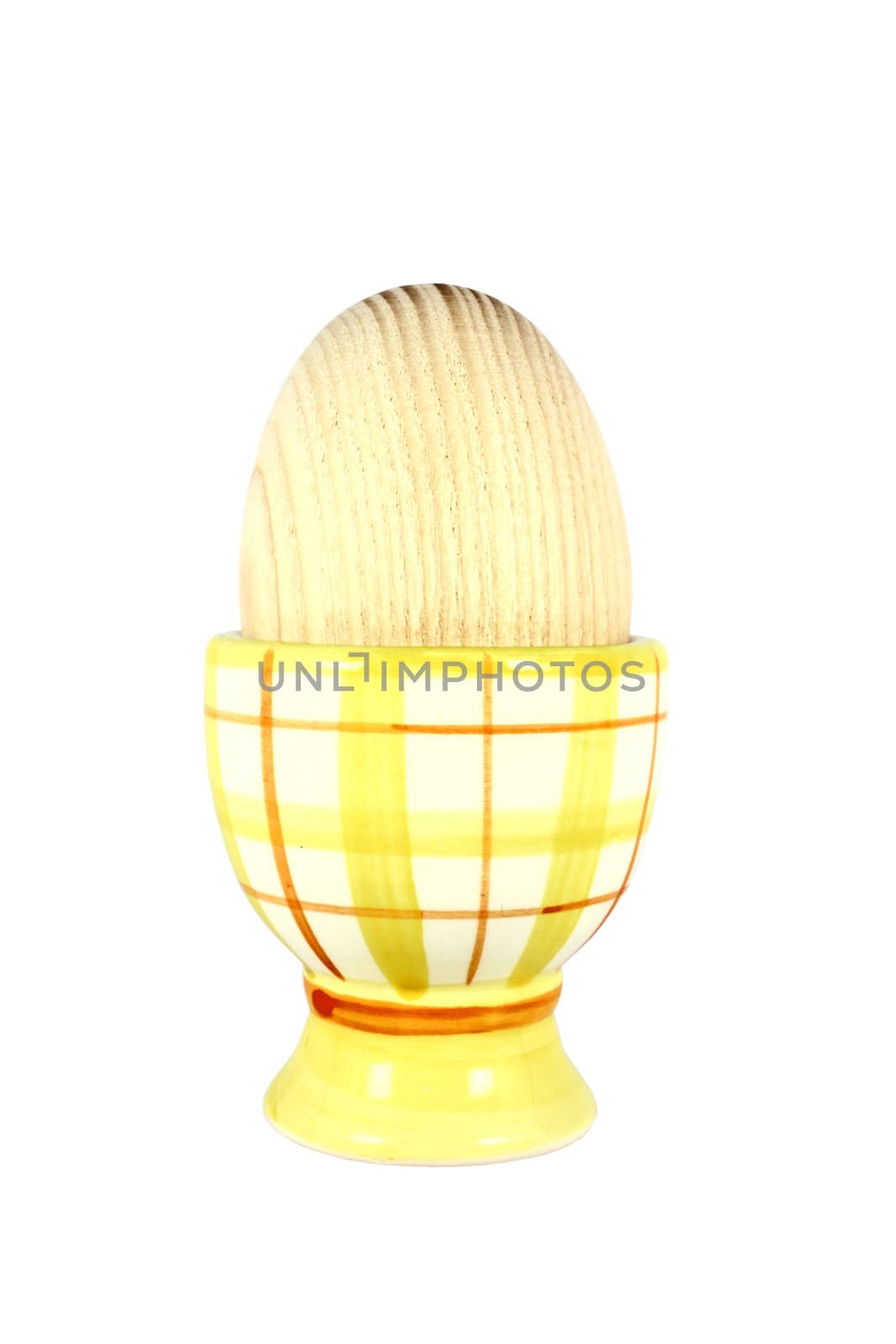 Wooden egg on the pedestal, isolated on white