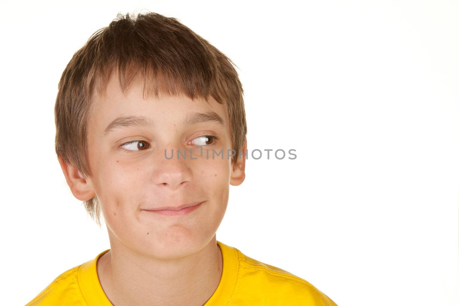 a boy looking into the white copyspace