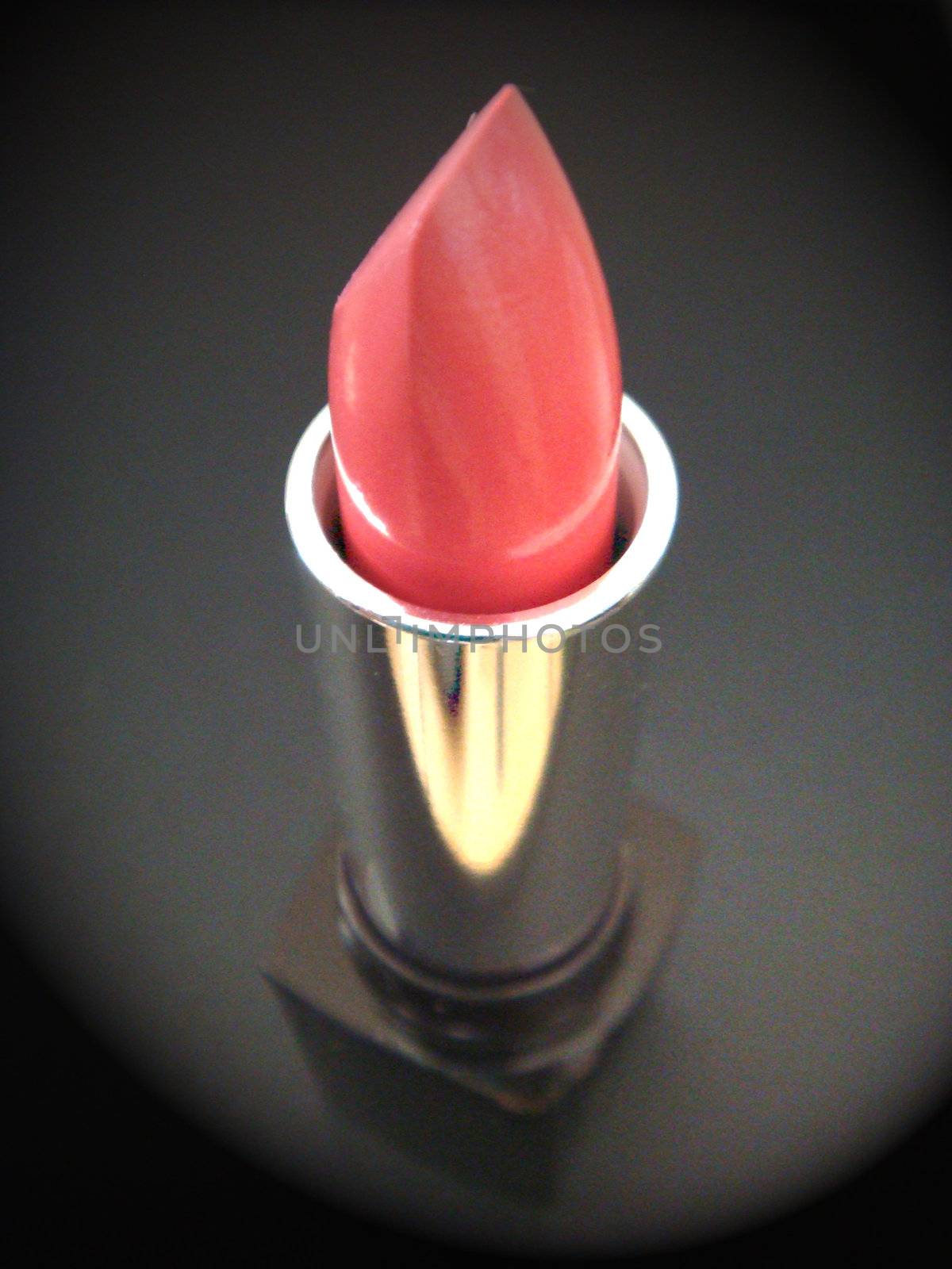 Close up photo from an above angle of a lipstick.