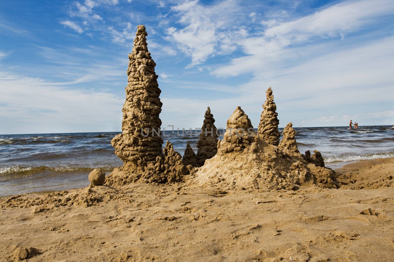 Towers of sand castle at the seaside