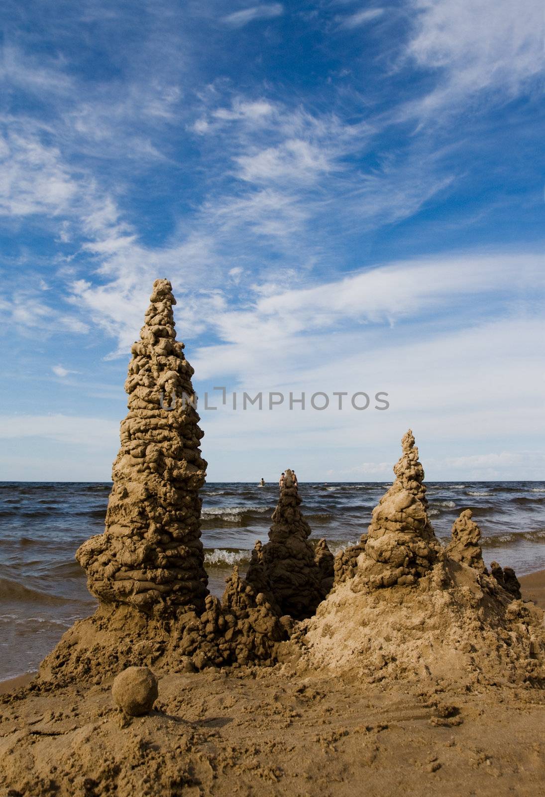 Towers of sand castle at the seaside