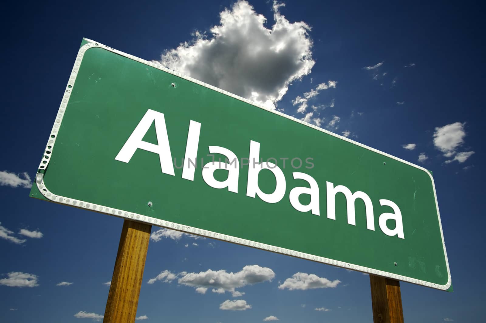 Alabama Road Sign with dramatic clouds and sky.