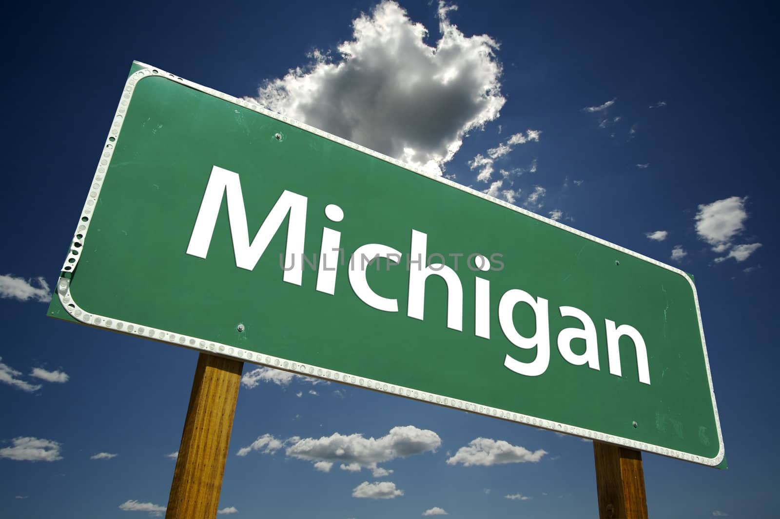Michigan Road Sign with dramatic clouds and sky.