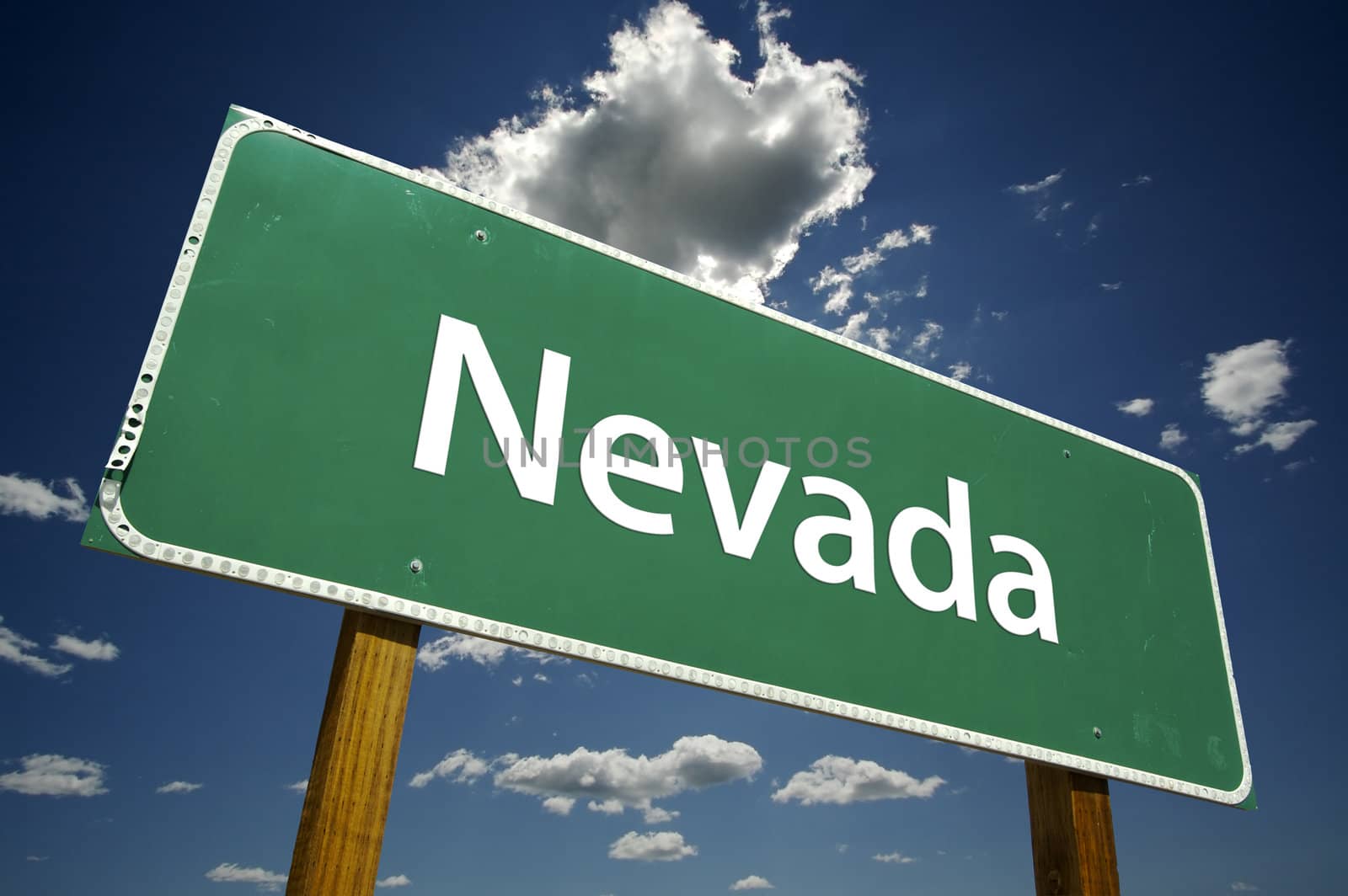 Nevada Road Sign with dramatic clouds and sky.