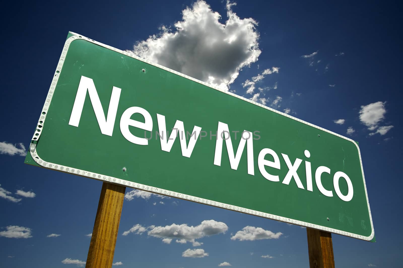 New Mexico Road Sign with dramatic clouds and sky.